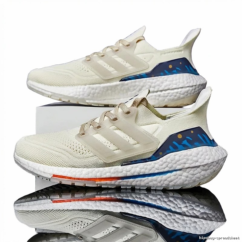 Adidas retro-style white and blue sports shoes